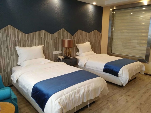 Imagen de la habitación del Hotel Sotel Cultura Huangguoshu Branch. Foto 7