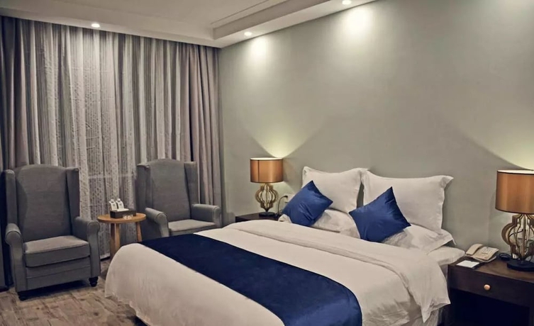 Imagen de la habitación del Hotel Sotel Cultura Huangguoshu Branch. Foto 8