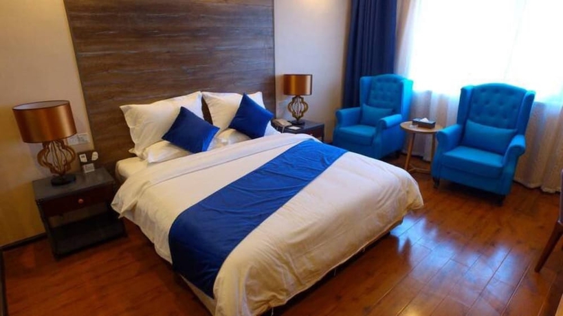 Imagen de la habitación del Hotel Sotel Cultura Huangguoshu Branch. Foto 12