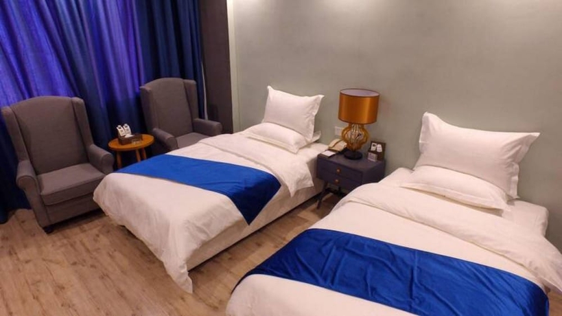 Imagen de la habitación del Hotel Sotel Cultura Huangguoshu Branch. Foto 13