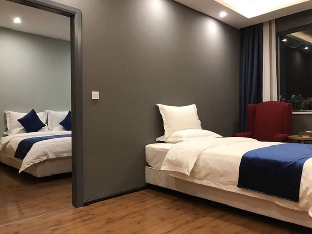 Imagen de la habitación del Hotel Sotel Cultura Huangguoshu Branch. Foto 14