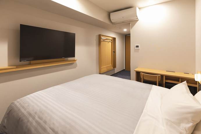 Imagen de la habitación del Hotel Sotetsu Fresa Inn Daimon. Foto 3