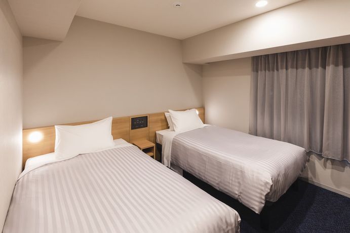 Imagen de la habitación del Hotel Sotetsu Fresa Inn Daimon. Foto 10