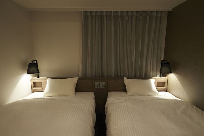 Imagen de la habitación del Hotel Sotetsu Fresa Inn Ginza Nanachome. Foto 14