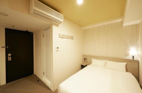 Imagen de la habitación del Hotel Sotetsu Fresa Inn Ginza Sanchome. Foto 5