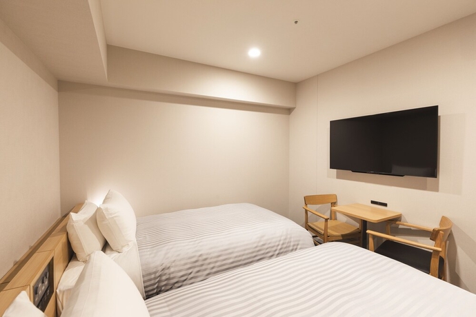 Imagen de la habitación del Hotel Sotetsu Fresa Inn Hiroshima. Foto 10
