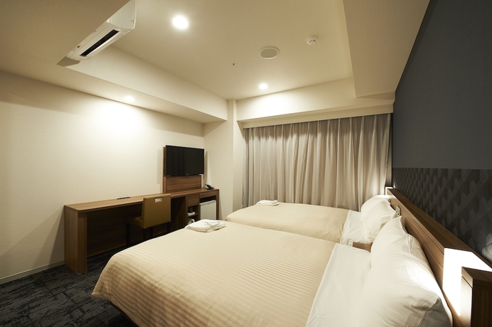 Imagen de la habitación del Hotel Sotetsu Fresa Inn Kitahama. Foto 6