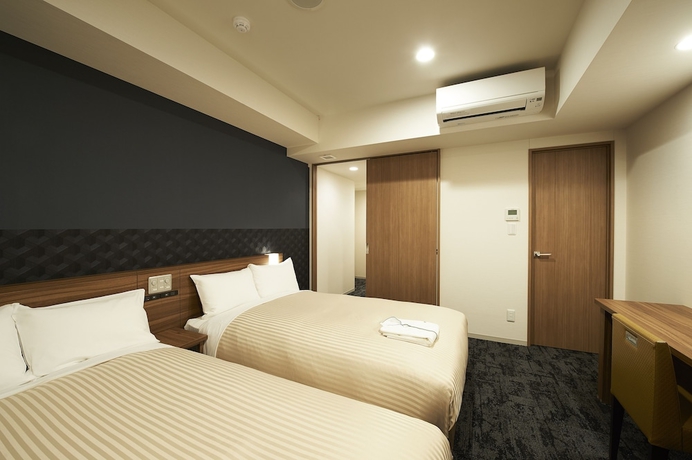 Imagen de la habitación del Hotel Sotetsu Fresa Inn Kitahama. Foto 7