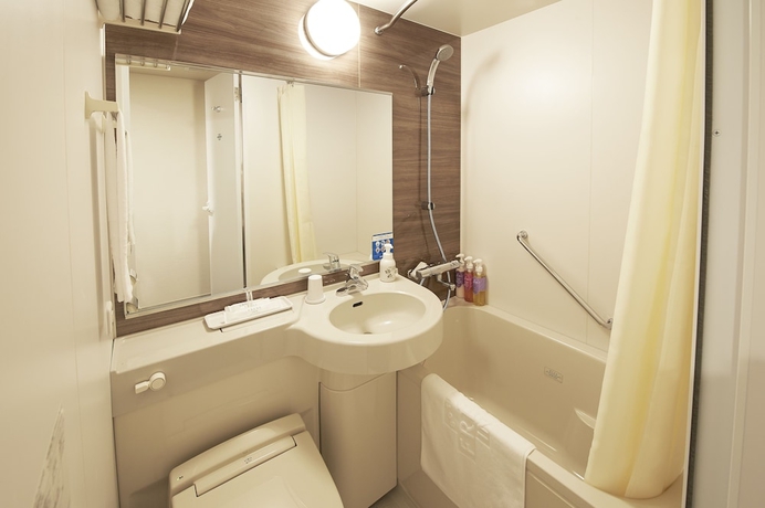 Imagen de la habitación del Hotel Sotetsu Fresa Inn Kitahama. Foto 8