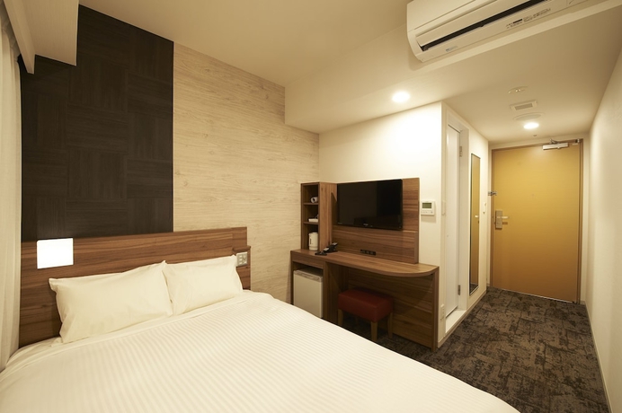 Imagen de la habitación del Hotel Sotetsu Fresa Inn Kitahama. Foto 11