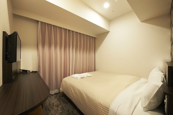Imagen de la habitación del Hotel Sotetsu Fresa Inn Kitahama. Foto 12