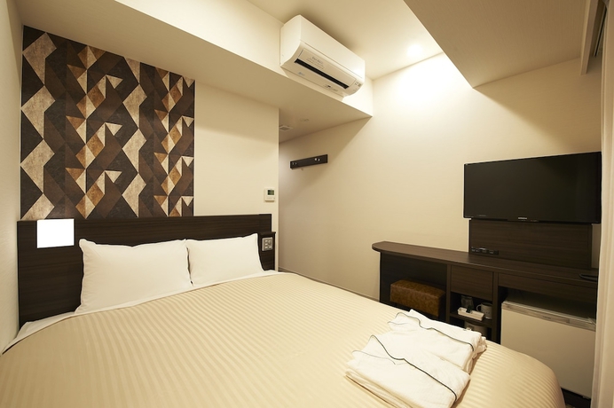 Imagen de la habitación del Hotel Sotetsu Fresa Inn Kitahama. Foto 13