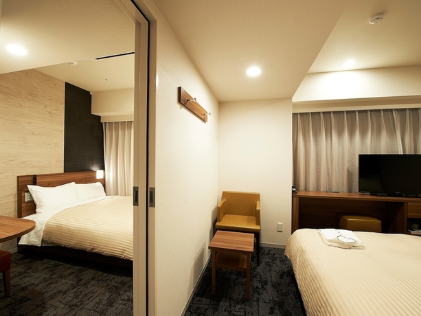 Imagen de la habitación del Hotel Sotetsu Fresa Inn Kitahama. Foto 16