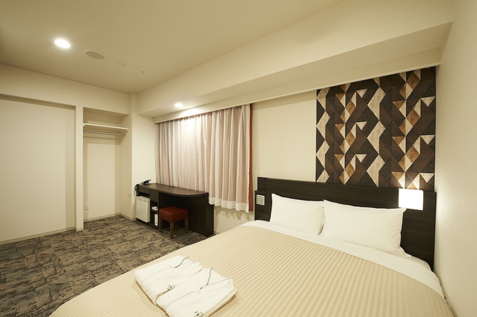 Imagen de la habitación del Hotel Sotetsu Fresa Inn Kitahama. Foto 18