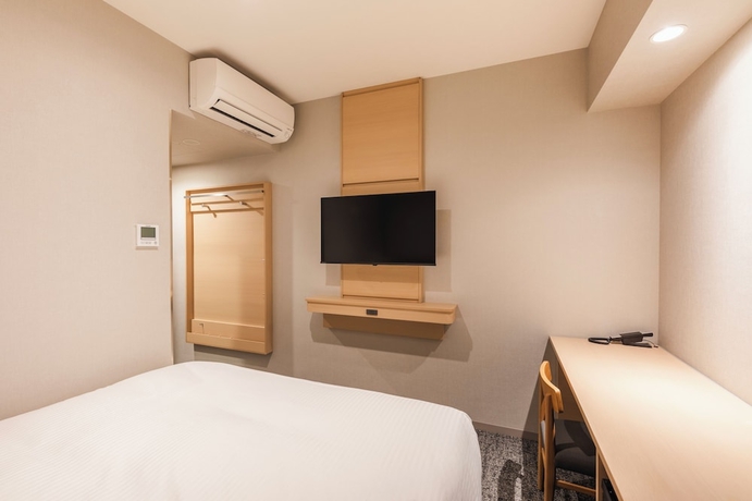 Imagen de la habitación del Hotel Sotetsu Fresa Inn Kitakami. Foto 9