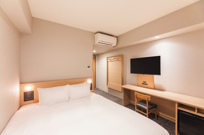 Imagen de la habitación del Hotel Sotetsu Fresa Inn Kitakami. Foto 11