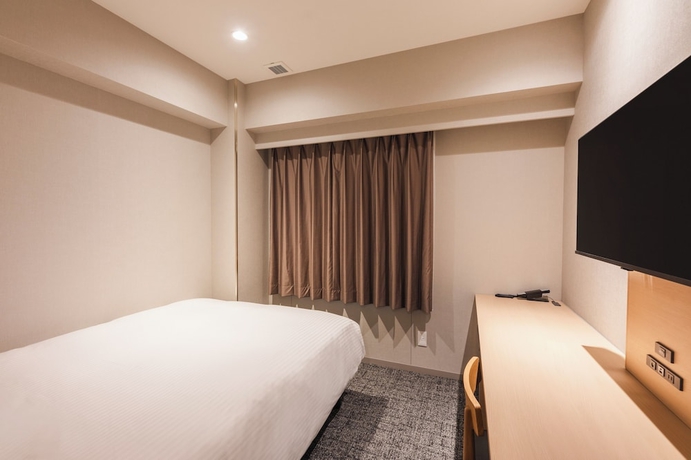 Imagen de la habitación del Hotel Sotetsu Fresa Inn Kitakami. Foto 12