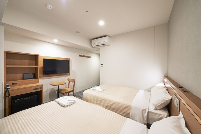 Imagen de la habitación del Hotel Sotetsu Fresa Inn Kobe Sannomiya. Foto 11