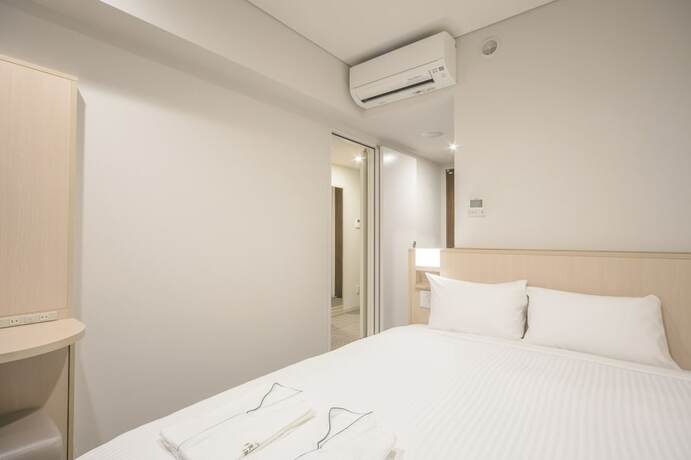 Imagen de la habitación del Hotel Sotetsu Fresa Inn Kyoto Hachijoguchi. Foto 14