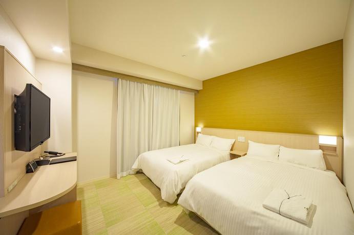 Imagen de la habitación del Hotel Sotetsu Fresa Inn Kyoto Shijokarasuma. Foto 5