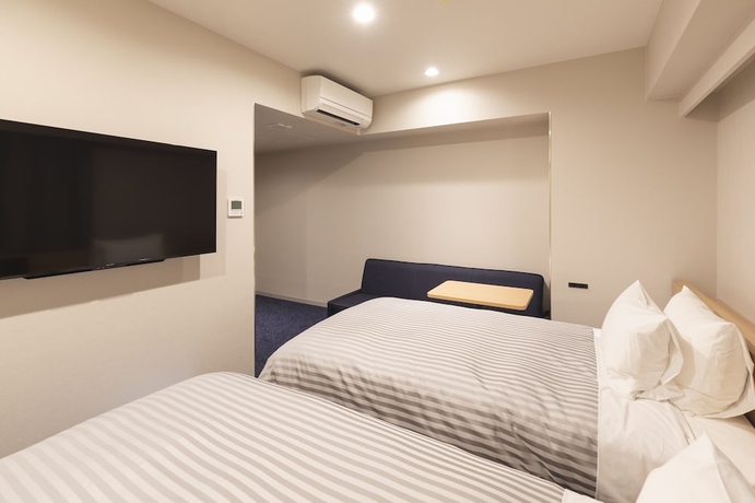 Imagen de la habitación del Hotel Sotetsu Fresa Inn Nagoya-shinkansenguchi. Foto 10