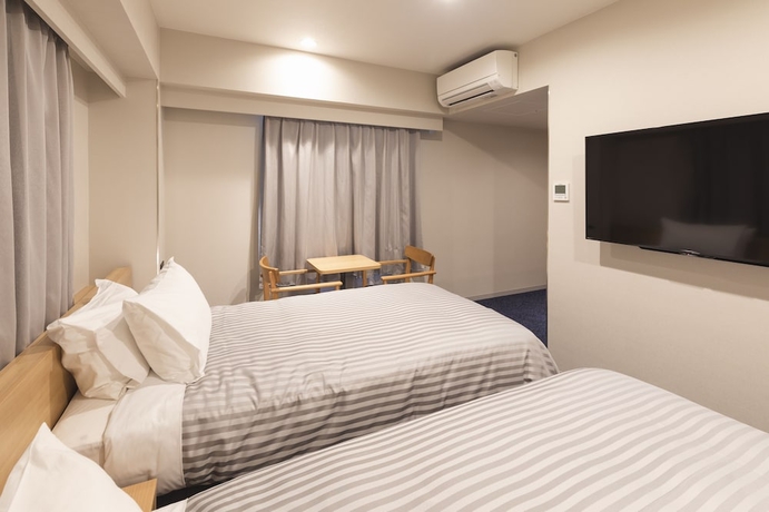 Imagen de la habitación del Hotel Sotetsu Fresa Inn Nagoya-shinkansenguchi. Foto 13