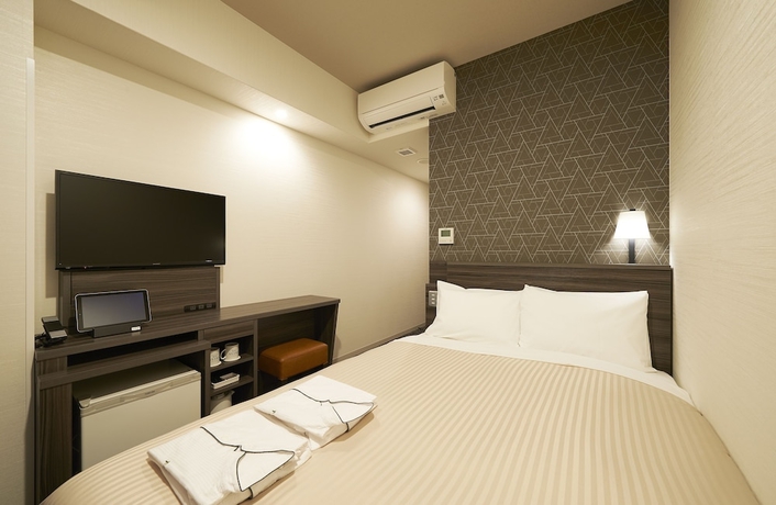 Imagen de la habitación del Hotel Sotetsu Fresa Inn Osaka Shinsaibashi. Foto 2