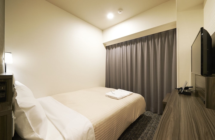 Imagen de la habitación del Hotel Sotetsu Fresa Inn Osaka Shinsaibashi. Foto 3
