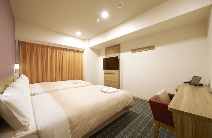 Imagen de la habitación del Hotel Sotetsu Fresa Inn Osaka Shinsaibashi. Foto 11