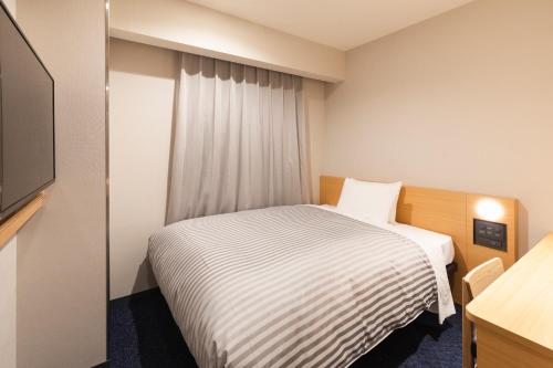 Imagen de la habitación del Hotel Sotetsu Fresa Inn Sendai. Foto 3
