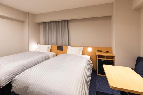 Imagen de la habitación del Hotel Sotetsu Fresa Inn Sendai. Foto 5