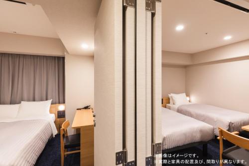 Imagen de la habitación del Hotel Sotetsu Fresa Inn Sendai. Foto 7