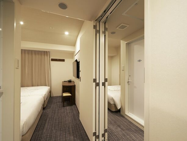 Imagen de la habitación del Hotel Sotetsu Fresa Inn Tokyo Roppongi. Foto 12