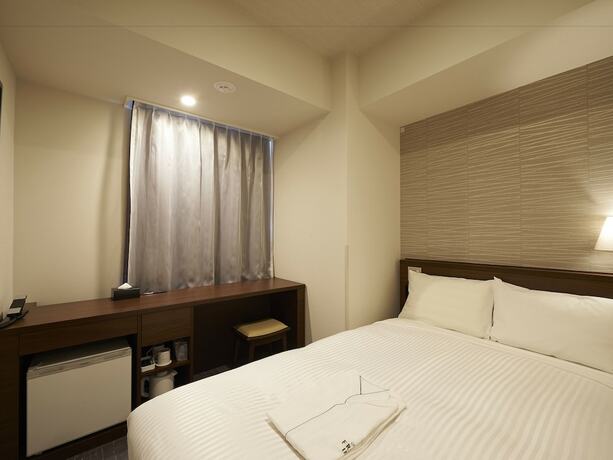 Imagen de la habitación del Hotel Sotetsu Fresa Inn Tokyo Roppongi. Foto 13