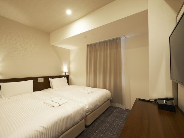 Imagen de la habitación del Hotel Sotetsu Fresa Inn Tokyo Roppongi. Foto 18
