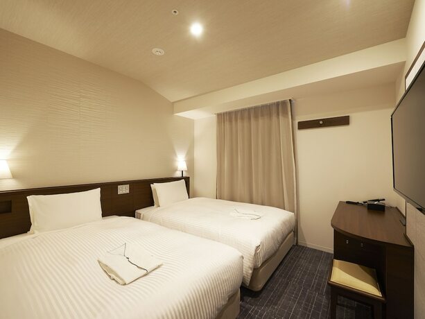 Imagen de la habitación del Hotel Sotetsu Fresa Inn Tokyo Roppongi. Foto 19