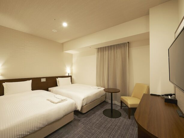Imagen de la habitación del Hotel Sotetsu Fresa Inn Tokyo Roppongi. Foto 21