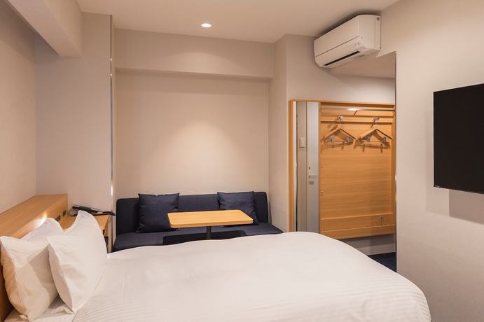 Imagen de la habitación del Hotel Sotetsu Fresa Inn Yodoyabashi. Foto 4