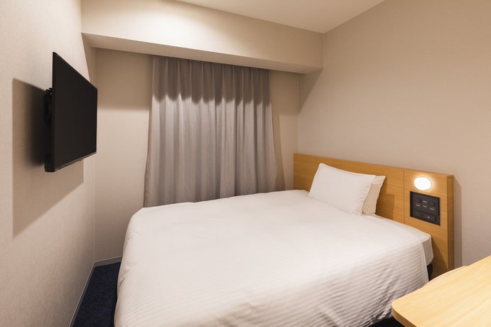 Imagen de la habitación del Hotel Sotetsu Fresa Inn Yodoyabashi. Foto 5