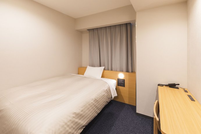 Imagen de la habitación del Hotel Sotetsu Fresa Inn Yodoyabashi. Foto 12
