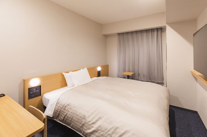 Imagen de la habitación del Hotel Sotetsu Fresa Inn Yodoyabashi. Foto 13