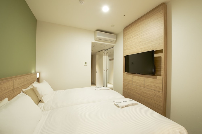 Imagen de la habitación del Hotel Sotetsu Fresa Inn Yokohama Higashiguchi. Foto 8