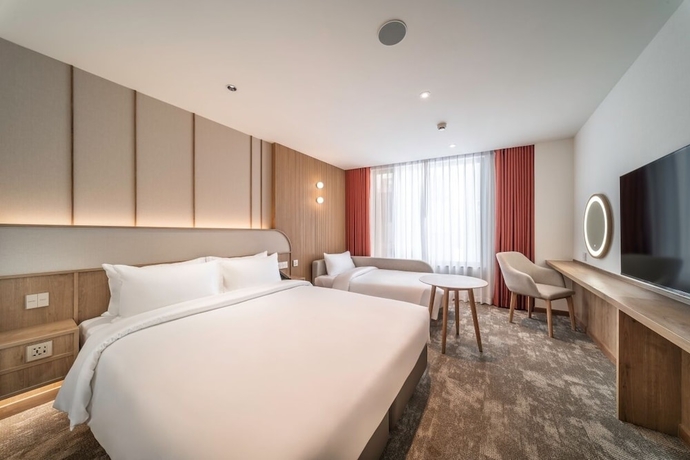 Imagen de la habitación del Hotel Sotetsu Grand Fresa Bangkok. Foto 8