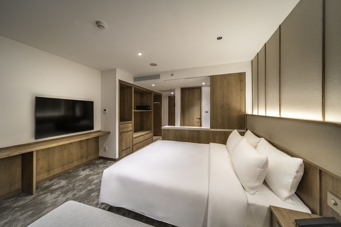 Imagen de la habitación del Hotel Sotetsu Grand Fresa Bangkok. Foto 11