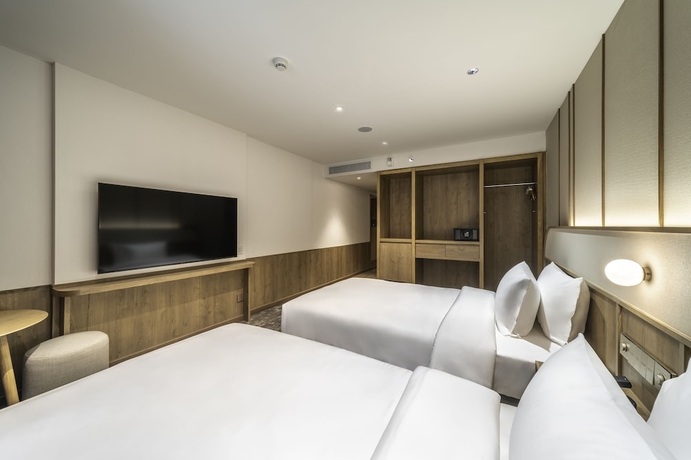 Imagen de la habitación del Hotel Sotetsu Grand Fresa Bangkok. Foto 14