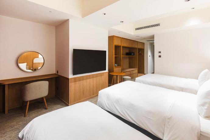 Imagen de la habitación del Hotel Sotetsu Grand Fresa Taipei Ximen. Foto 2