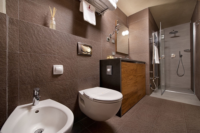 Imagen de la habitación del Hotel Sottovento Luxury Hospitality. Foto 10