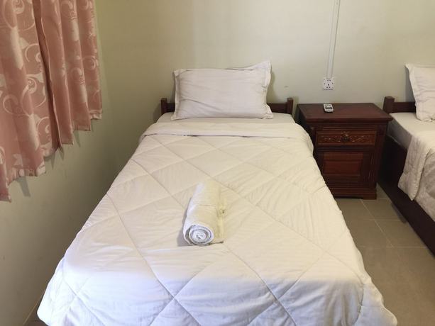 Imagen de la habitación del Hotel Souk San Sun Set Bungalow. Foto 9