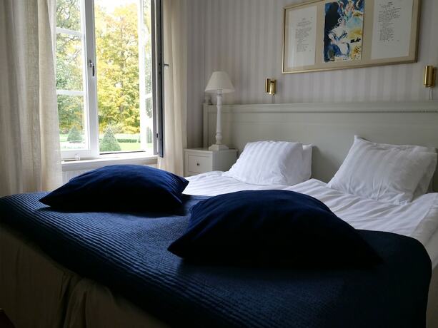 Imagen de la habitación del Hotel Södertuna Slott. Foto 19
