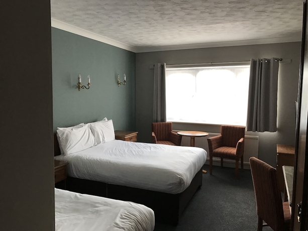 Imagen de la habitación del Hotel South Lawn. Foto 11